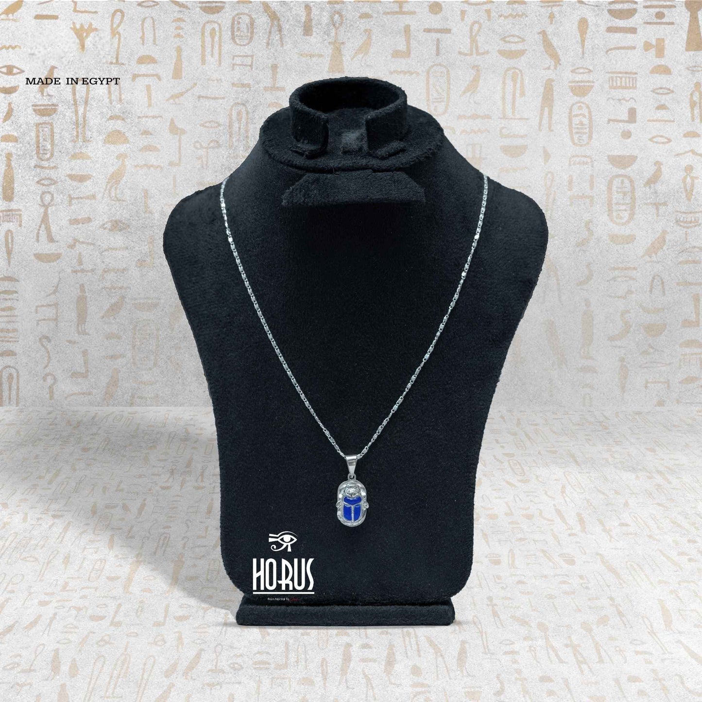 جعران فرعوني فضي بالأزرق الملكي - Horus jewellery NecklaceHorus jewellery